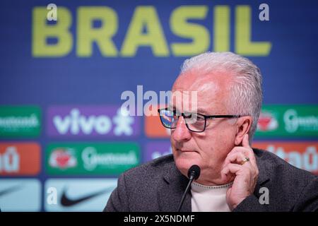 Rio De Janeiro, Brazil. 10th May, 2024. Dorival Junior, coach of the Brazilian national soccer team, listens to a journalist's question during a press conference. The coach announced the squad for the Copa America soccer championship, which will take place in the USA from June 20 to July 24, 2024. Credit: Joao Gabriel Alves/dpa/Alamy Live News Stock Photo