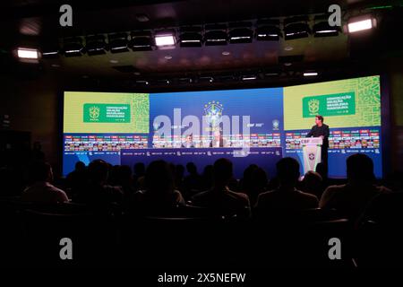 Rio De Janeiro, Brazil. 10th May, 2024. Dorival Junior (M), coach of the Brazilian national soccer team, speaks at a press conference. The coach announced the squad for the Copa America soccer championship, which will take place in the USA from June 20 to July 24, 2024. Credit: Joao Gabriel Alves/dpa/Alamy Live News Stock Photo