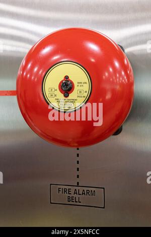 Fire alarm bell on the wall of hotel. Stock Photo