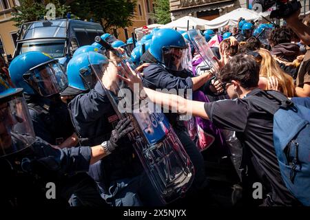 Rome, Italy. 10th May, 2024. 'My body my choice', junior and university students protest in Rome against the 'antiabortion and antifeminism policy of the government'. Protesters, trying to reach the venue of the birth rate conference, are blocked by the police. (Credit Image: © Marco Di Gianvito/ZUMA Press Wire) EDITORIAL USAGE ONLY! Not for Commercial USAGE! Credit: ZUMA Press, Inc./Alamy Live News Stock Photo