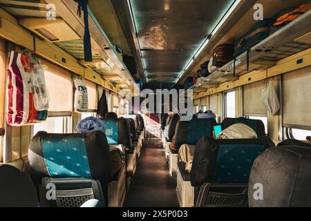 The interior of an Egyptian Railways train riding in first class in one of the older 'Spanish Express' carraiges Stock Photo