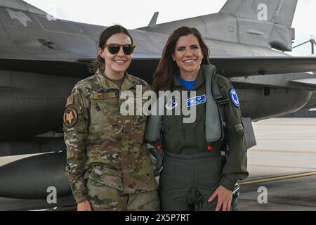 Eastover, United States. 05 May, 2024. U.S. Rep. Nancy Mace, right, wearing a flight suit poses with Senior Airman Ashley Spivey, a crew chief assigned to the 169th Aircraft Maintenance Squadron,, after her orientation flight in the back seat of a U.S Air Force F-16 flight jet during a visit to McEntire Joint National Guard Base, May 5, 2024, in Eastover, South Carolina.  Credit: SMSgt. Caycee Watson/U.S Air Force/Alamy Live News Stock Photo