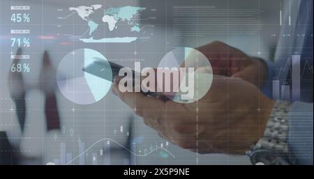 Statistical data processing against mid section of a businessman using smartphone Stock Photo