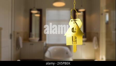 Image of golden key with house shape over bathroom Stock Photo