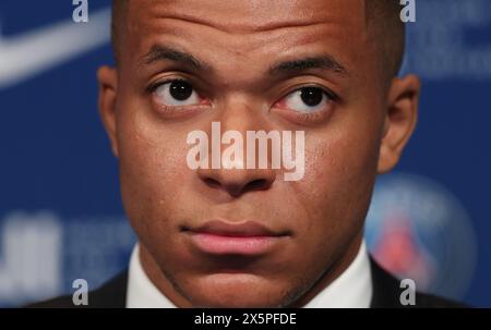 Paris, France. 10th May, 2024. This file photo taken on May 23, 2022 shows Paris Saint-Germain's French forward Kylian Mbappe attending a press conference to sign a new contract until 2025 at PSG at the Parc des Princes stadium in Paris, France. Kylian Mbappe confirmed on May 10, 2024, that he will leave French Ligue 1 club Paris Saint-Germain at the end of the season, without revealing his next destination. Credit: Gao Jing/Xinhua/Alamy Live News Stock Photo