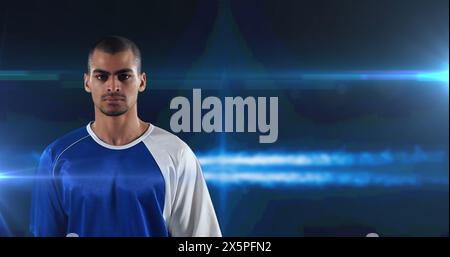 Image of basketball player over glowing blue background Stock Photo