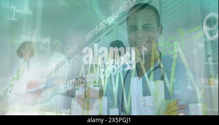 Image of financial data and graphs over happy biracial male doctor Stock Photo