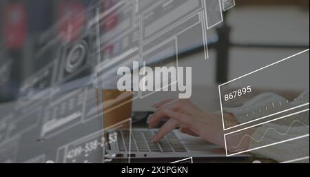 Image of data processing over hands using laptop Stock Photo