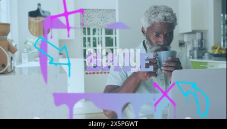 Image of sale text banner over african american man drinking coffee and using laptop Stock Photo