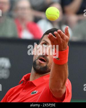 Rome, Italy. 10th May, 2024. Novak Djokovic of Serbia serves during the men's singles round of 64 match against Corentin Moutet of France at the ATP Italian Open in Rome, Italy, May 10, 2024. Credit: Alberto Lingria/Xinhua/Alamy Live News Stock Photo