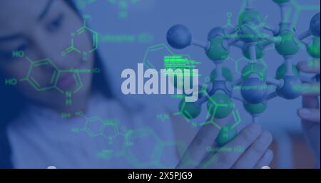 Image of data processing and chemical formula over biracial schoolgirl Stock Photo