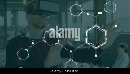 Image of chemical formulas over caucasian men using vr headset Stock Photo