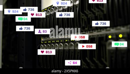 Image of multiple social media icons against close up of a computer server Stock Photo