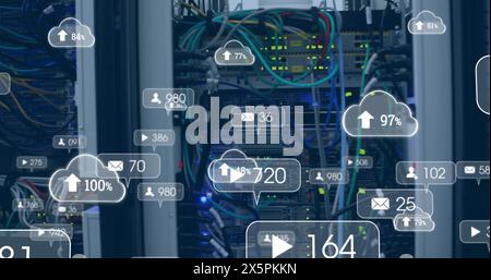 Image of multiple social media icons against close up of a computer server Stock Photo