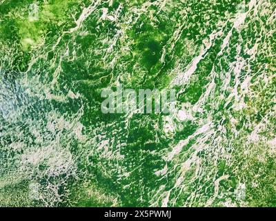Texture of artistic plaster green and white colors. Abstract art stucco emerald background with pattern, macro. Structure of decorative wall, backdrop Stock Photo