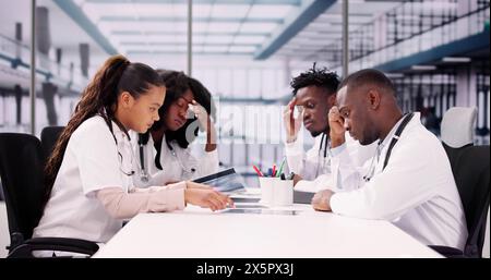 Boring Training Doctor Meeting In Hospital. Unmotivated Team Stock Photo