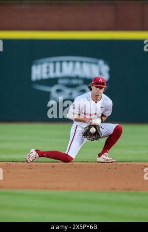 May 10, 2024: Razorback infielder Peyton Stovall #10 goes down on one knee to field a bouncing ball hit towards him. Arkansas defeated Mississippi State 7-5 in Fayetteville, AR. Richey Miller/CSM(Credit Image: © Richey Miller/Cal Sport Media) Stock Photo