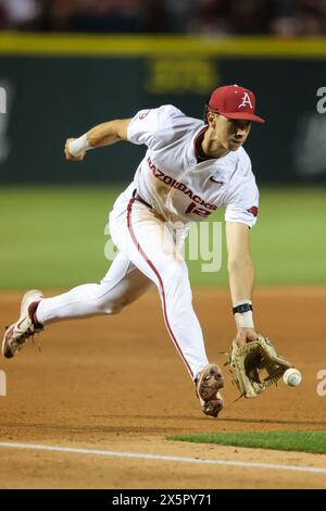 May 10, 2024: Razorback infielder Jared Sprague-Lott #12 comes towards the grass to field a ball hit down the third base line. Arkansas defeated Mississippi State 7-5 in Fayetteville, AR. Richey Miller/CSM(Credit Image: © Richey Miller/Cal Sport Media) Stock Photo