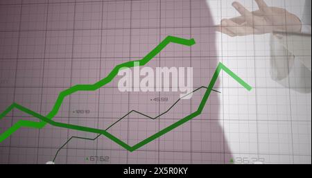 Image of green lines over grid and data processing Stock Photo