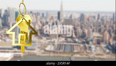 Image of gold house key and fob over out of focus cityscape Stock Photo