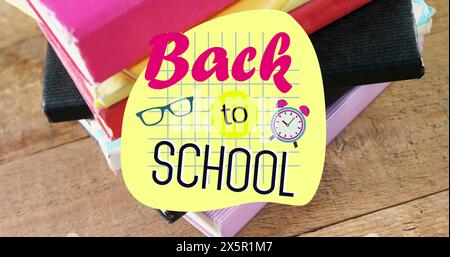 School supplies, including books and glasses, resting on wooden table Stock Photo