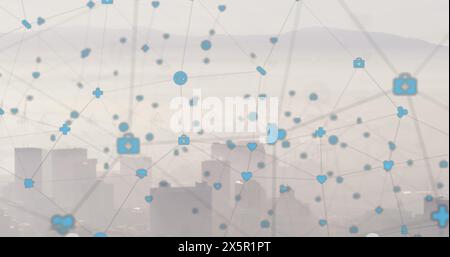 Image of tech icons with connections floating over cityscape Stock Photo