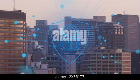 Image of tech icons with connections and digital padlock, floating over cityscape Stock Photo