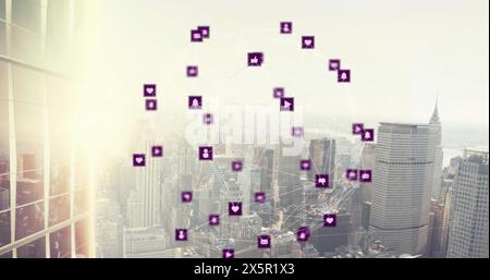 Image of network of connections with icons over cityscape Stock Photo