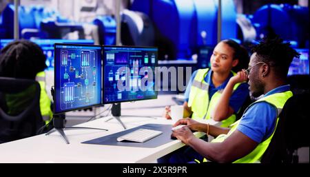 Engineer Operators Using Scada System At Industrial Plant Stock Photo