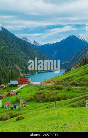 Alpine lake Kolsai in Kazakhstan. Beautiful mountain natural landscape. Nature reserve. View from above. Stock Photo