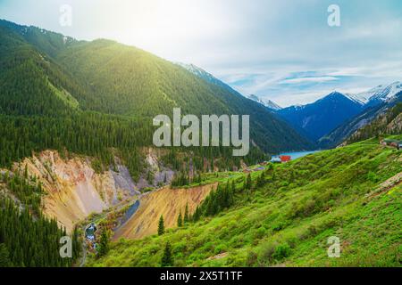 Alpine lake Kolsai in Kazakhstan. Beautiful mountain natural landscape. Nature reserve. View from above. Stock Photo