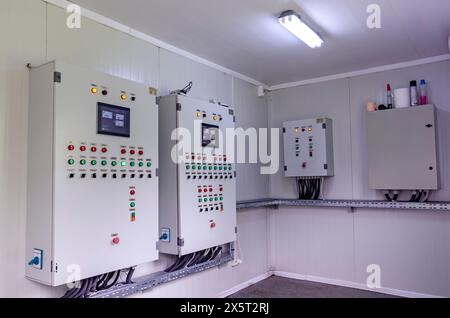 technical room with automated control panel, for a domestic water purification and treatment station Stock Photo
