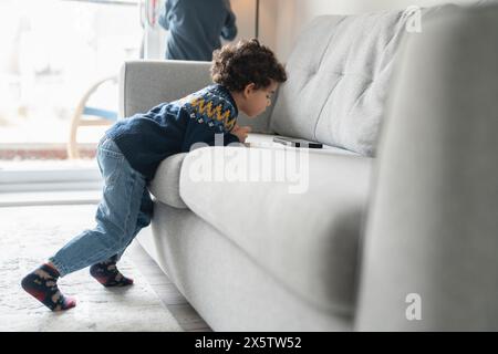 Boy (2-3) using digital tablet at home Stock Photo