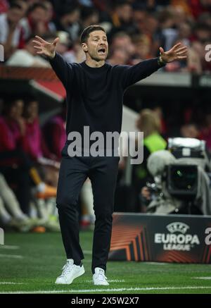 LEVERKUSEN, GERMANY - MAY 09: Coach Xabi Alonso of Bayer Leverkusen reacts from the sideline during the UEFA Europa League 2023/24 Semi-Final second leg match between Bayer 04 Leverkusen and AS Roma at BayArena on May 09, 2024 in Leverkusen, Germany. © diebilderwelt / Alamy Stock Stock Photo