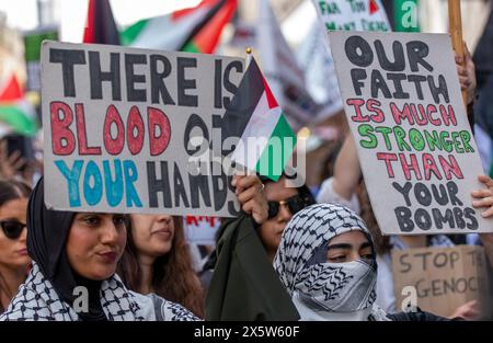 Manchester, UK. 11th May, 2024. Young women with  protest banners. Palestinian Protest Manchester.The pro Palestinian Protesters   marched through  Manchester city centre disrupting shoppers and public transport. This was the 32nd consecutive weekend protest since October the 7th 2023 to take place in the city. Manchester UK. Credit: GaryRobertsphotography/Alamy Live News Stock Photo