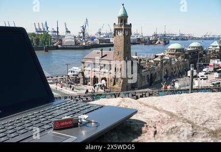 Airbnb Key with Notebook at Hamburg Harbor - Elbe View Stock Photo