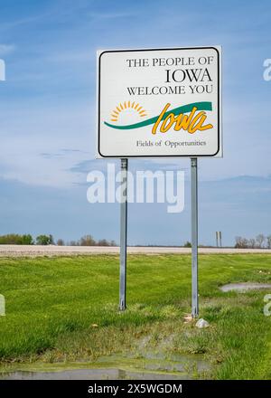 Iowa Road Signs Examples Iowa welcome roadside sign against blue sky at state border with ...