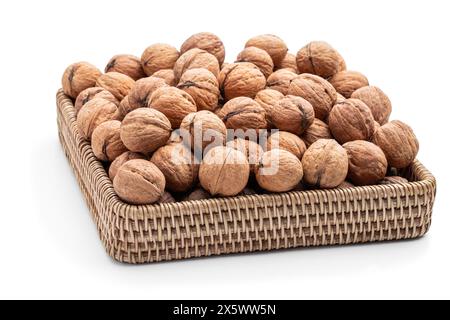 Fresh  organic walnuts in shell isolated on white background Stock Photo