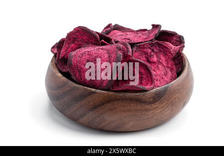 Dried  beetroot chips in wooden bowl isolated on white background Stock Photo
