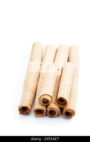Delicious  of waffer rolls with boiled condensed milk isolated on white background Stock Photo