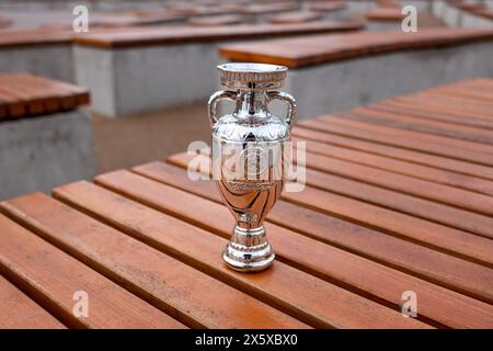April 17, 2024, Berlin, Germany. The European Football Championship Cup in the city park. Stock Photo