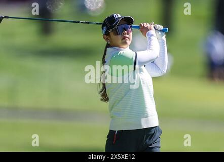 Clifton, NJ, USA. 11th May, 2024. Yuri Yoshida of Japan watches her fairway shot during the third round at the Cognizant Founders Cup at the Upper Montclair Country Club in Clifton, NJ. Mike Langish/CSM/Alamy Live News Stock Photo