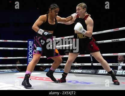 Jessica McCaskill (left) and Lauren Price in the IBA and WBO World Welter weight bout at Cardiff Utilita Arena. Picture date: Saturday May 11, 2024. Stock Photo