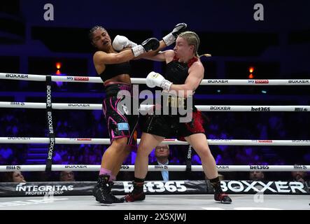 Jessica McCaskill (left) and Lauren Price in the IBA and WBO World Welter weight bout at Cardiff Utilita Arena. Picture date: Saturday May 11, 2024. Stock Photo