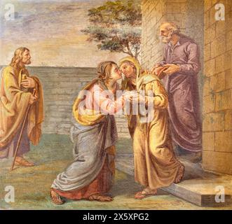 MILAN, ITALY - MARCH 6, 2024: The fresco of Visiation in the church Basilica di Sant Eustorgio by unknown artist. Stock Photo