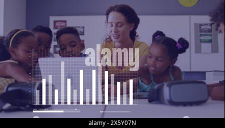 Image of data processing over happy diverse female teacher and pupils using laptop in class Stock Photo