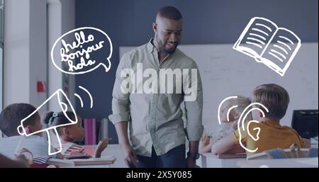 Image of language icons over happy african american male teacher and pupils in class Stock Photo