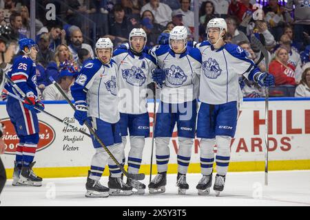 May 10th, 2024: Syracuse Crunch players celebrate a goal in the first period against the Rochester Americans. The Rochester Americans hosted the Syracuse Crunch in Game 5 of the American Hockey League Northeast Division Semifinals at Blue Cross Arena in Rochester, New York. (Jonathan Tenca/CSM) Stock Photo