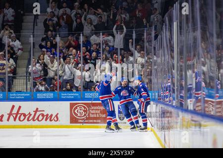 May 10th, 2024: Rochester Americans players celebrate a goal in the first period against the Syracuse Crunch. The Rochester Americans hosted the Syracuse Crunch in Game 5 of the American Hockey League Northeast Division Semifinals at Blue Cross Arena in Rochester, New York. (Jonathan Tenca/CSM) Stock Photo