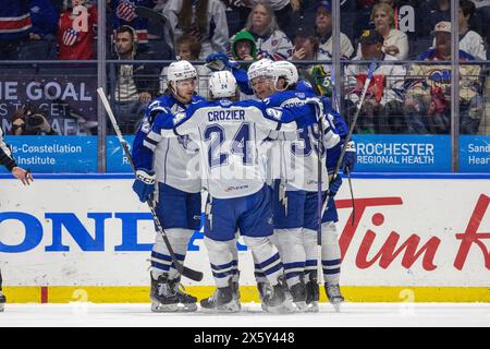 May 10th, 2024: Syracuse Crunch players celebrate a goal in the second period against the Rochester Americans. The Rochester Americans hosted the Syracuse Crunch in Game 5 of the American Hockey League Northeast Division Semifinals at Blue Cross Arena in Rochester, New York. (Jonathan Tenca/CSM) Stock Photo